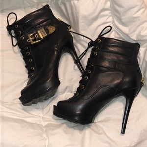 Black booties with gold buckle- guess